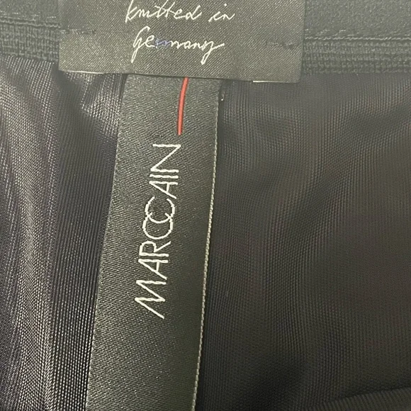 Marc Cain knit black knee length skirt with metallic silver side seams. - Picture 12 of 14